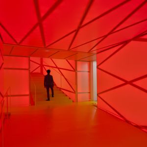 interior of the building with red lighting on the stretched canvas